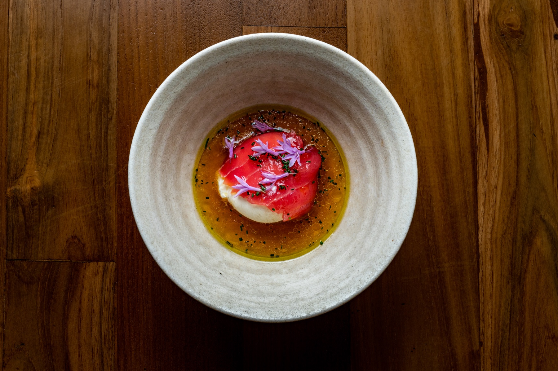 Tuna with delicate flowers and aromatic broth